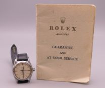 A Rolex Oyster Speedking stainless steel wristwatch, with Rolex guarantee booklet. 3.25 cm wide.