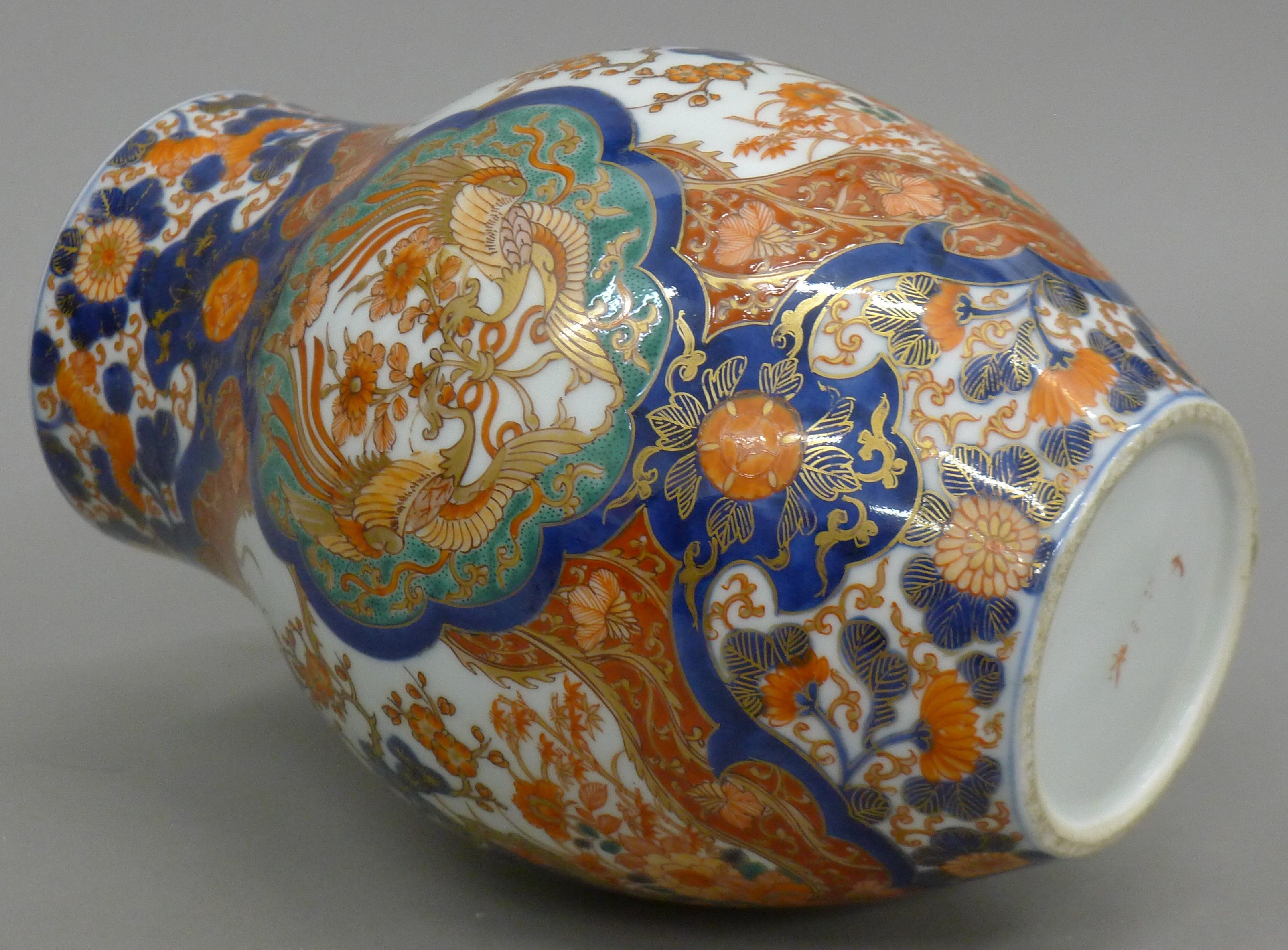 A 19th century Japanese Imari porcelain vase. 24.5 cm high. - Image 6 of 7