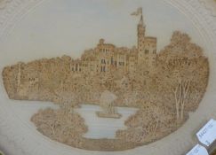 A Victorian cork picture, depicting a castle, oval framed. 31.5 cm wide overall.