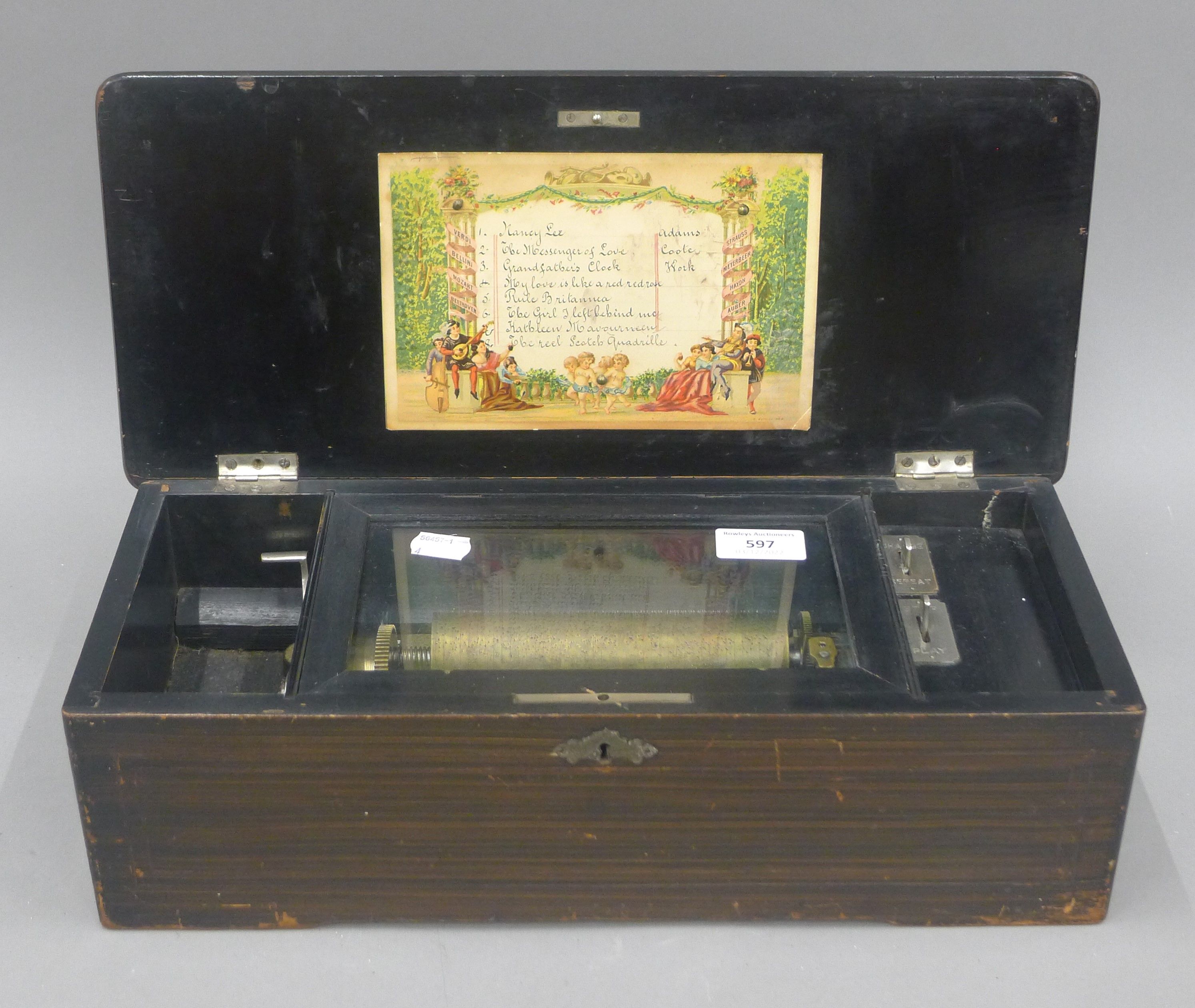 A 19th century inlaid music box. 43 cm wide.