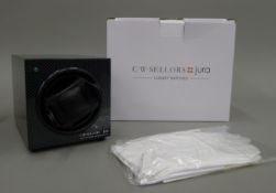 A boxed C W Sellors watch winder.