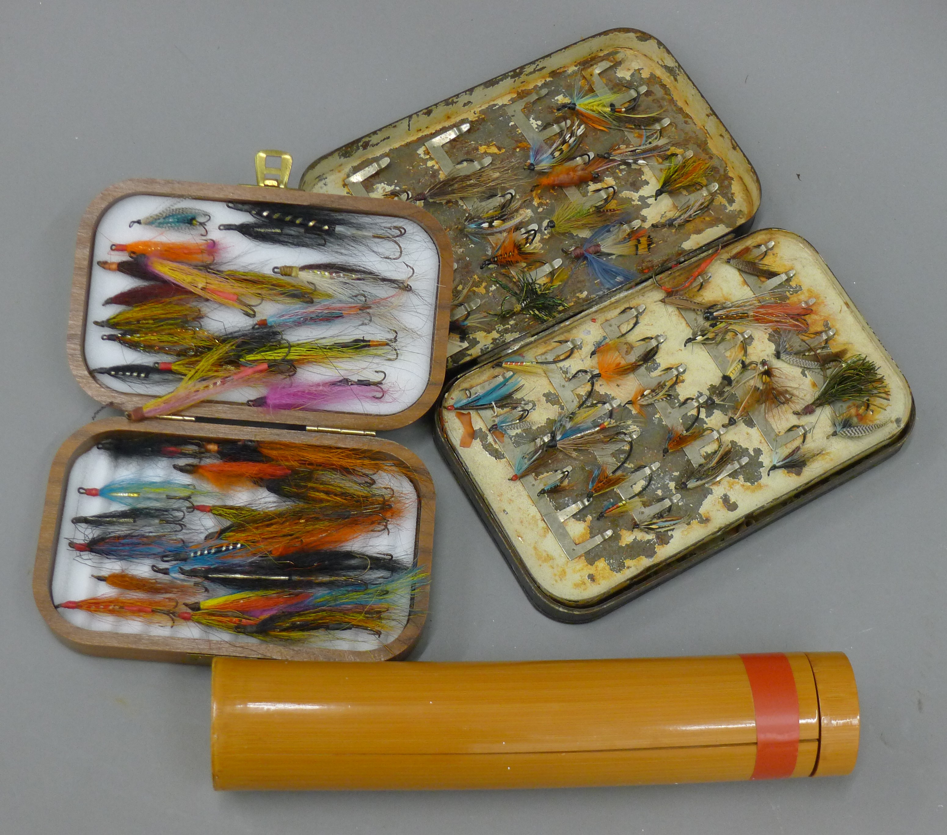 A quantity of fishing flies and floats.