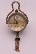 A miniature ball watch. Clock 3 cm high.