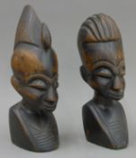 A pair of Yoruba Tribe figural busts. The largest 27 cm high.