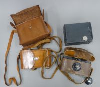 A quantity of various cameras.