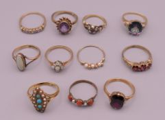 A quantity of rings, mostly 9 ct, one 18 ct, two 10 ct. 21.5 grammes total weight.