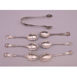 Six silver teaspoons and a pair of sugar tongs. Spoons 10.5 cm long. 103 grammes.