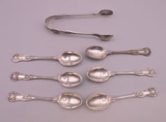 Six silver teaspoons and a pair of sugar tongs. Spoons 10.5 cm long. 103 grammes.