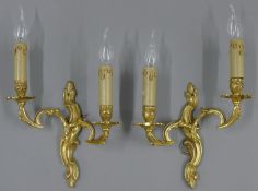 A pair of brass wall lights. 41 cm high overall.