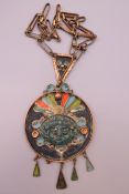 A Mexican pendant on chain. Pendant 8 cm diameter.