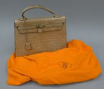 A Hermes handbag. 32.5 cm long.
