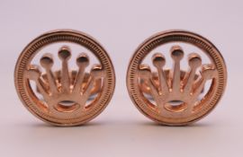 A pair of Rolex cufflinks in a Penrose of London box. 2 cm diameter.