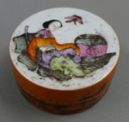 A Chinese porcelain paste box. 6.5 cm diameter.