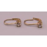 A pair of 9 ct gold earrings. 1.4 grammes total weight.