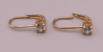 A pair of 9 ct gold earrings. 1.4 grammes total weight.