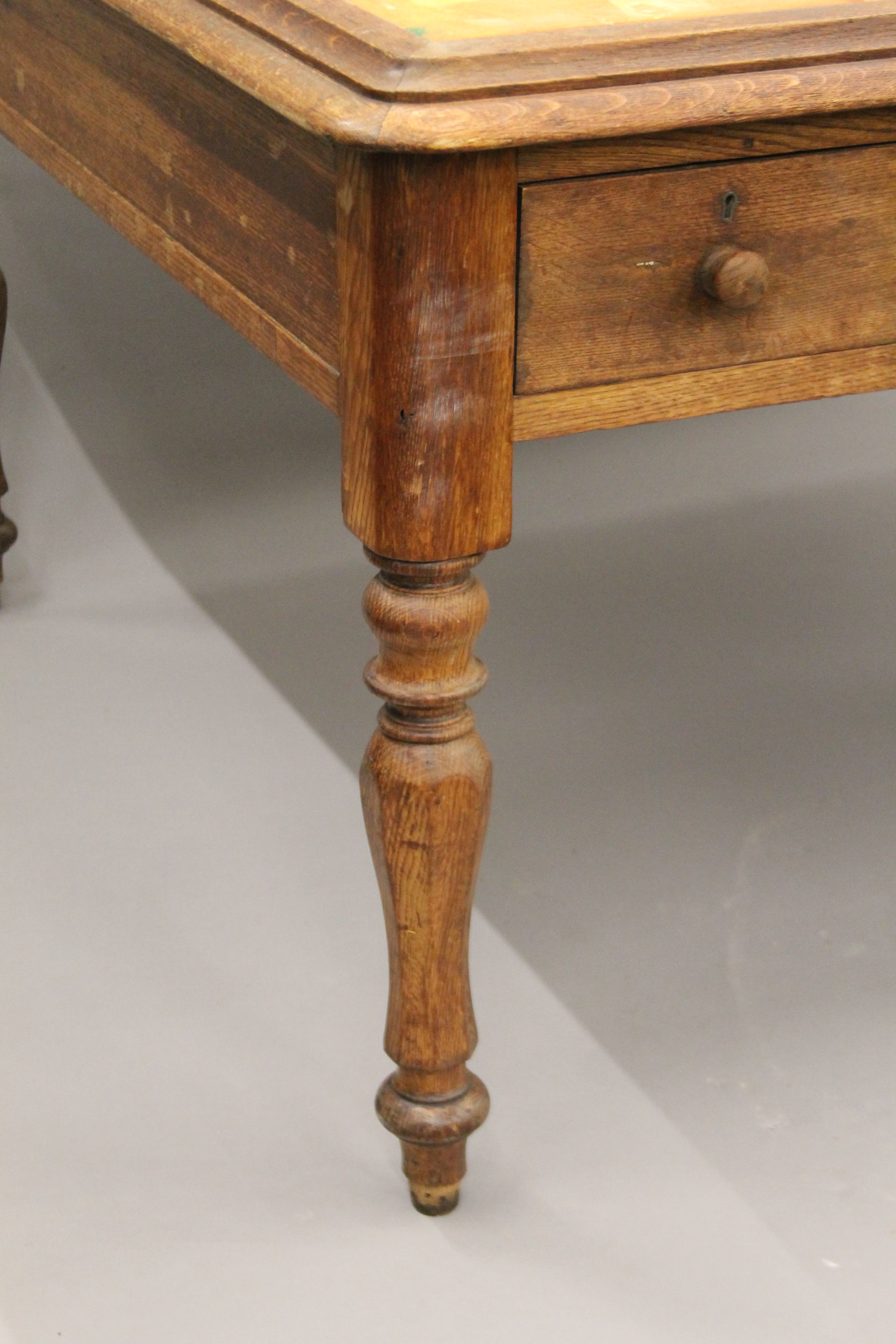 A Victorian oak partner's writing table. 153 cm wide. - Image 5 of 5