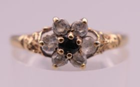 A 9 ct gold sapphire ring. Ring size Q/R. 1.5 grammes total weight.