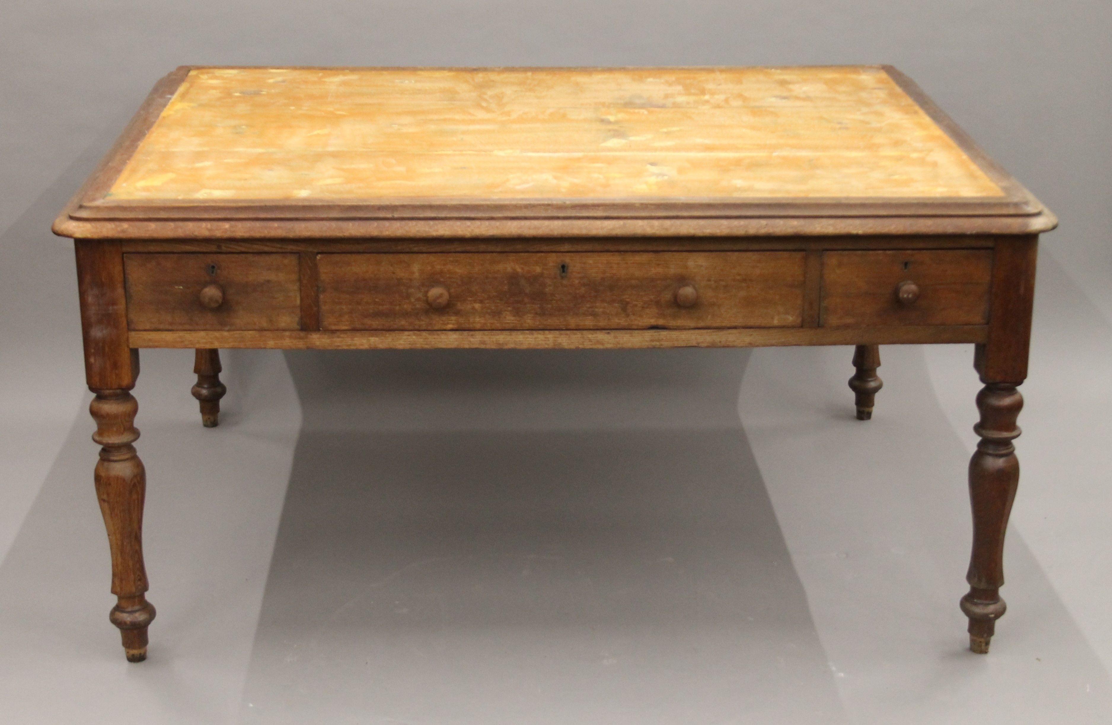 A Victorian oak partner's writing table. 153 cm wide. - Image 4 of 5