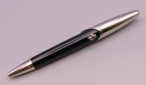 A Ferrari pen. 15 cm long.