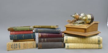 A quantity of various books, a vintage telephone and a vintage Scalextric Datsun.