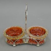 A silver plate and cranberry glass bon-bon stand. 21.5 cm wide.