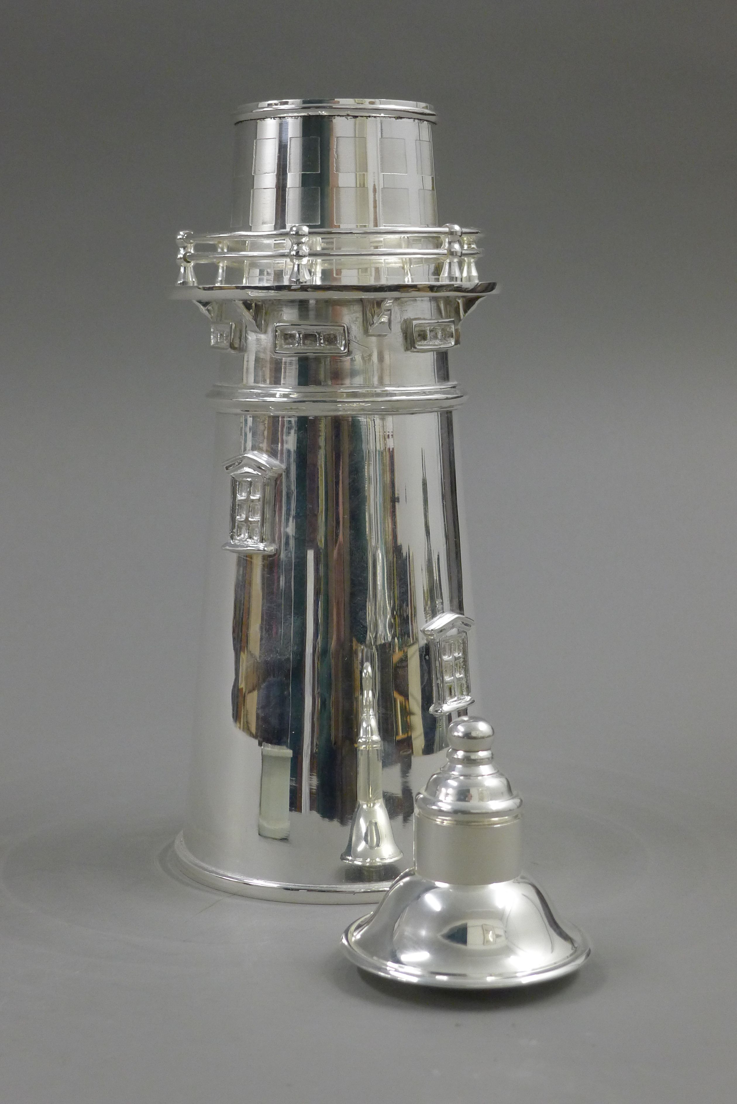 A silver plated cocktail shaker formed as a lighthouse. 34 cm high. - Image 2 of 3