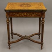 A 19th century style French folding card table. 70 cm wide.