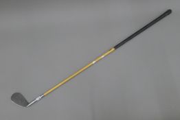 A W Mitchell Rustess Zenith Mashie-Niblick seven-iron golf club. 94.5 cm long.