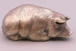 A silver model of a pig bearing Russian marks. 6 cm long.