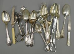 A quantity of silver and silver plated cutlery. 319.3 grammes of silver.