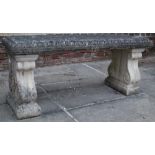 Regency style composition garden bench seat with flat top on scrolled end supports with