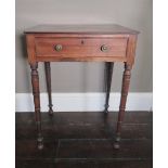 Regency mahogany side table, the rounded rectangular top above a cockbeaded drawer with brass drum
