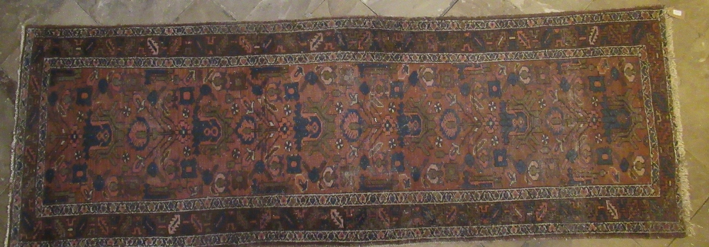 Caucasian multicoloured runner, field filled with polychrome stylized foliage and medallion on a