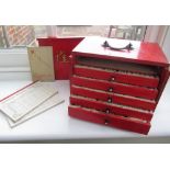 C20th Mah-Jong set in red five drawer slide front case with brass carry handle, instructions and