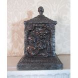 C19th square cast lead tobacco box, the sides decorated with courting couples, the stepped