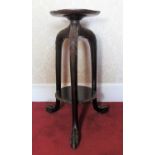 Chippendale style mahogany torchere, circular dished top with carved detail on three down scrolled