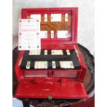 Mudies's of London Rubicon Bezique set in red leather case, with two markers and two decks of cards,