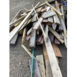 Large collection of cut timber of various sizes, cuts etc