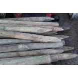 Large collection of fence posts,