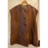 C20th tan leather jerkin, with four buttons, and blanket lining