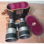 Pair of Troughton & Simms chromed and green leather binoculars, the shades revealing presentation