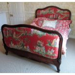 Early C20th rosewood double bedstead, the serpentine moulded head and footboards brass nail