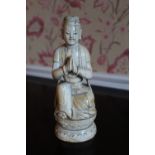 C17th/18th Chinese ivory model of an Acolyte, carved in royal pose with hands in anjali mudra on