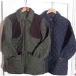 Barbour green quilted shooting jacket with suede shoulder patches and pocket trim, elasticated