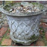 Pair of composition garden urns, slightly flared lattice work design on shaped base with four