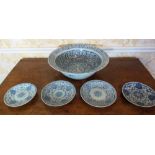 Large Chinese wash bowl, all over decorated in blue and white with profuse scrolled foliage,