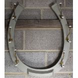 Horseshoe shaped painted vintage coat rack, six double brass hooks with ceramic ball finials,
