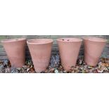 Set of four Yorkshire terracotta flower pots of circular tapering form, H40cm D33cm (4)