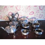 Geo.III style EPNS three-piece tea service, another with gadrooned borders, an entree dish and a