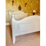 French style cream painted double bedstead, panelled arched head and foot boards with ball